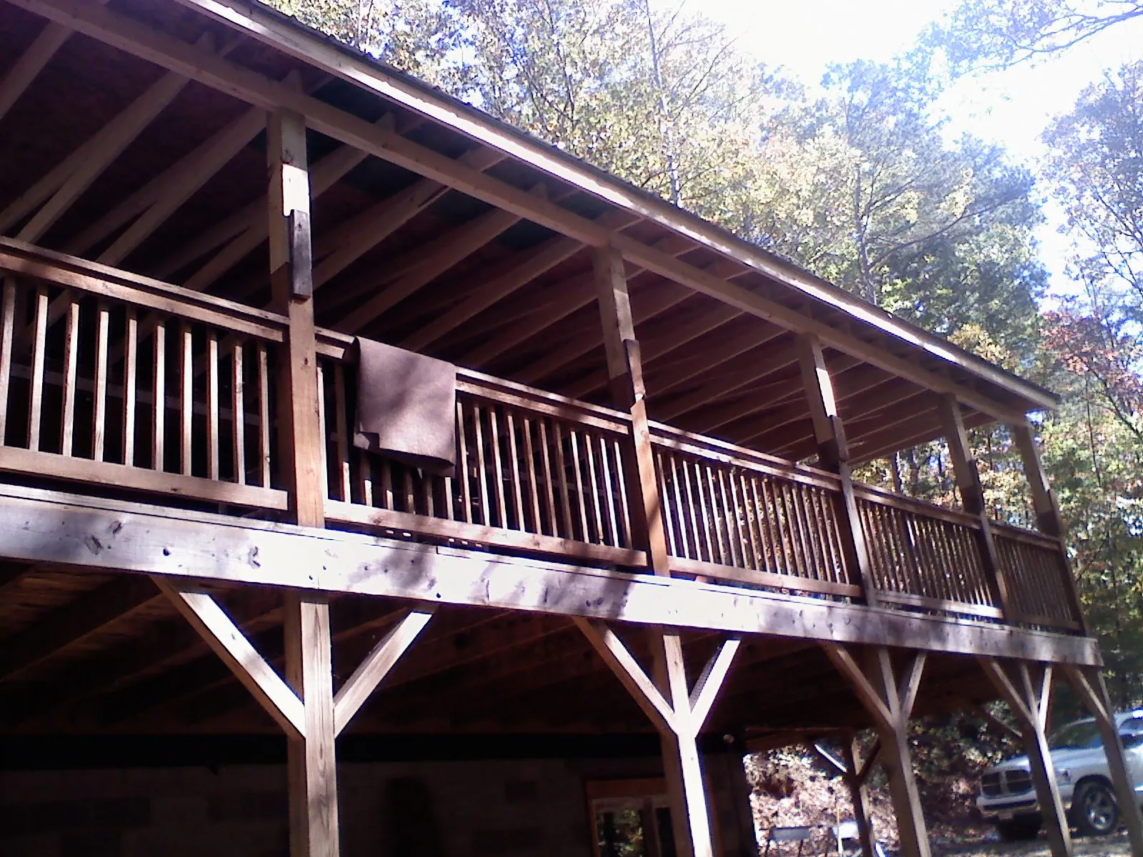 Timber framing under a new elevated porch and deck — Roof Leak Repair in South Wellfleet by Roofing Brothers